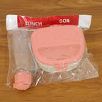 Compact plastic lunch box set with secure lid and water bottle