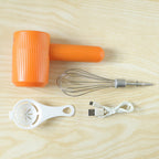 Detachable whisk head removed for cleaning from electric handheld mixer