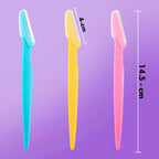 Multiple painless facial razors neatly arranged on a clean white background.