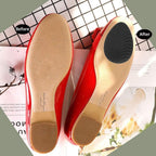 Non-Slip Shoe Pads applied neatly to the soles of elegant high heels for enhanced grip and protection.