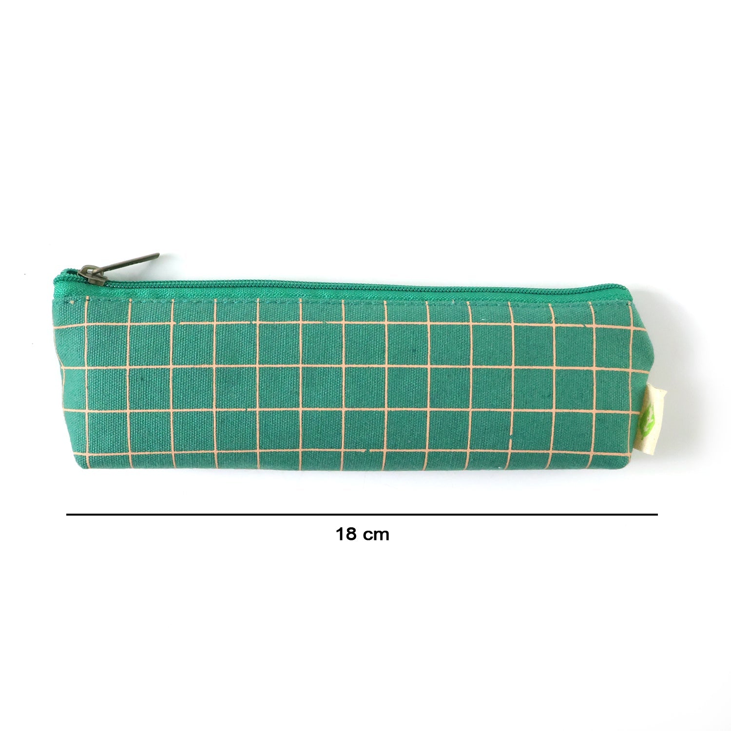 Flat lay of green grid pencil pouch with other school supplies.
