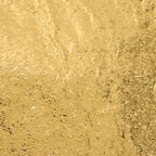 Close-up of a self-adhesive golden kitchen foil sticker roll.