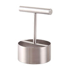 Fruit corer demonstrating how to remove a core from an apple.