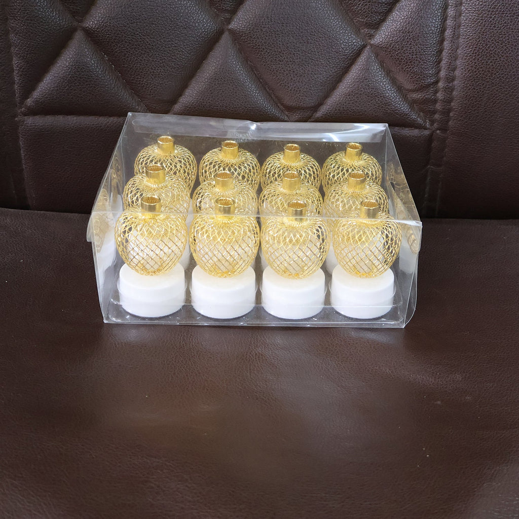 Golden mesh apple shape LED tealight candle glowing softly