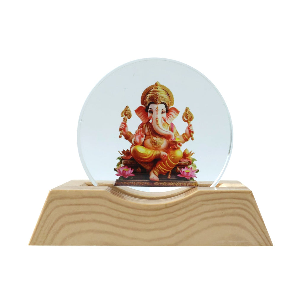 Spiritual 3D Lord Ganesha LED night lamp glowing warmly in a dark room