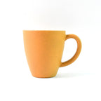 Two Konvex drinking mugs in a modern kitchen setting