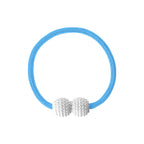 Detailed view of braided polyester rope and strong magnet on curtain tieback