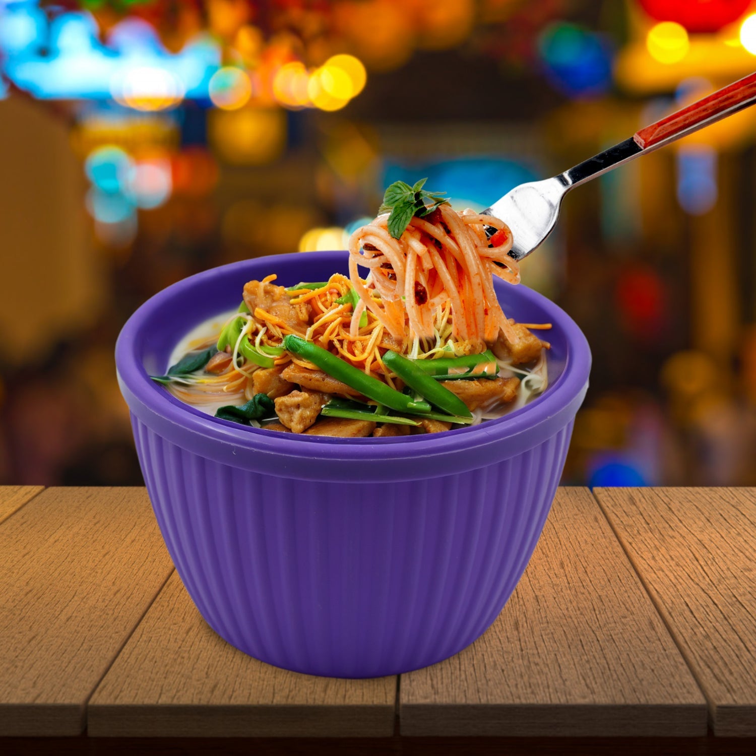 Plastic noodles bowl for a quick meal, showcased on a clean surface.