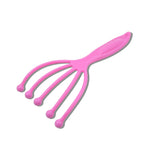 Side profile of the compact AuriGlam handheld scalp massager, highlighting its design.