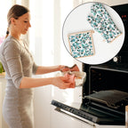 Durable cotton oven mitt for protecting hands from hot surfaces.