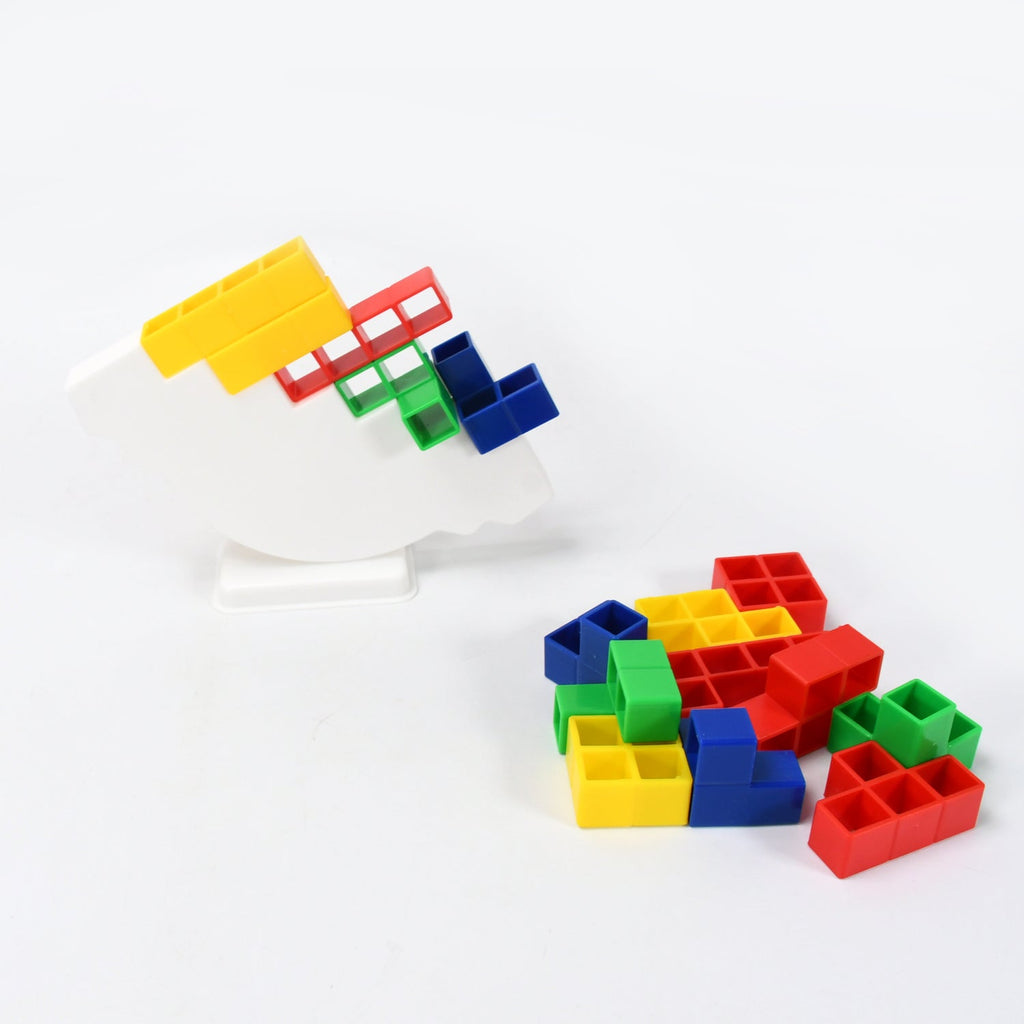 Children happily playing with the Tower Balance Game, developing their skills.