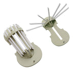 Plastic retractable wall hanger fully extended, holding various household items.