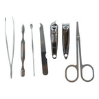 Nail care grooming kit tools arranged inside a protective storage case