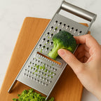 Stainless steel grater & slicer kitchen tool with 3-in-1 blades for grating and slicing