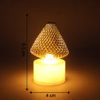 Close-up view of LED flameless tealight candle light with golden net shade