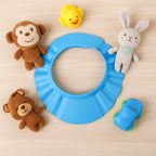 Baby shower hat protecting eyes and ears during bath