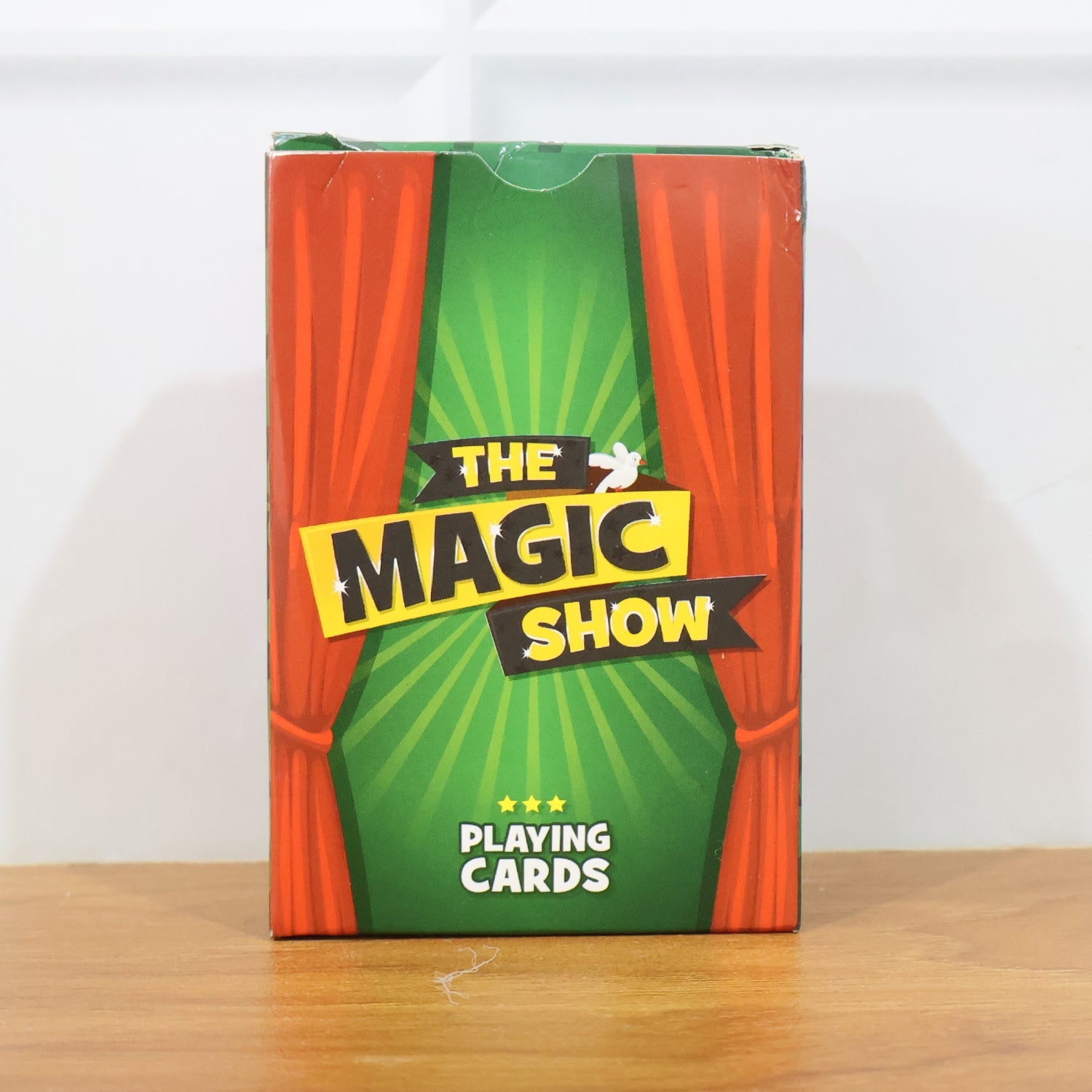Stack of Magic Show playing cards in hand