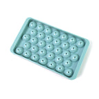 Detail view of the flexible silicone and PP plastic used in the 33-mould ice ball tray.