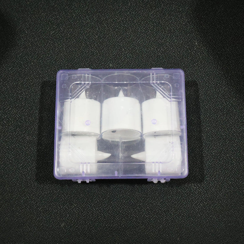 Battery-operated flameless votive candle lit softly for mood lighting