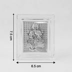 Sacred silver embossed Lord Ganesha photo frame displayed on altar