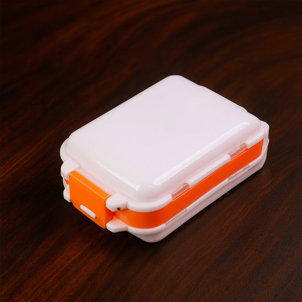 Portable pill organizer showing bright translucent lids for easy content viewing