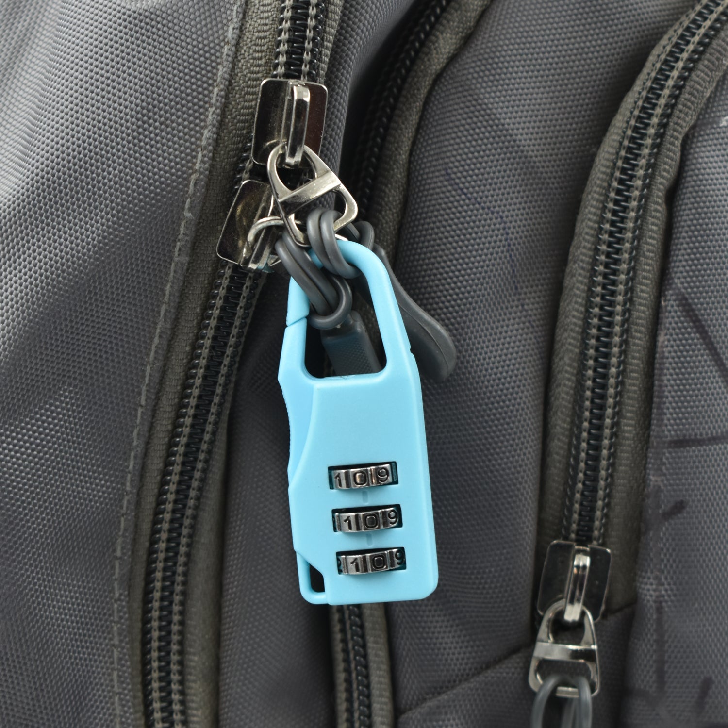 The small 3-digit lock open, showing its internal mechanism.