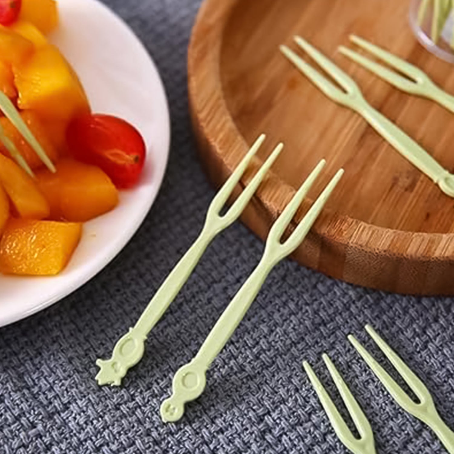 Colorful cartoon-themed plastic fruit dessert forks