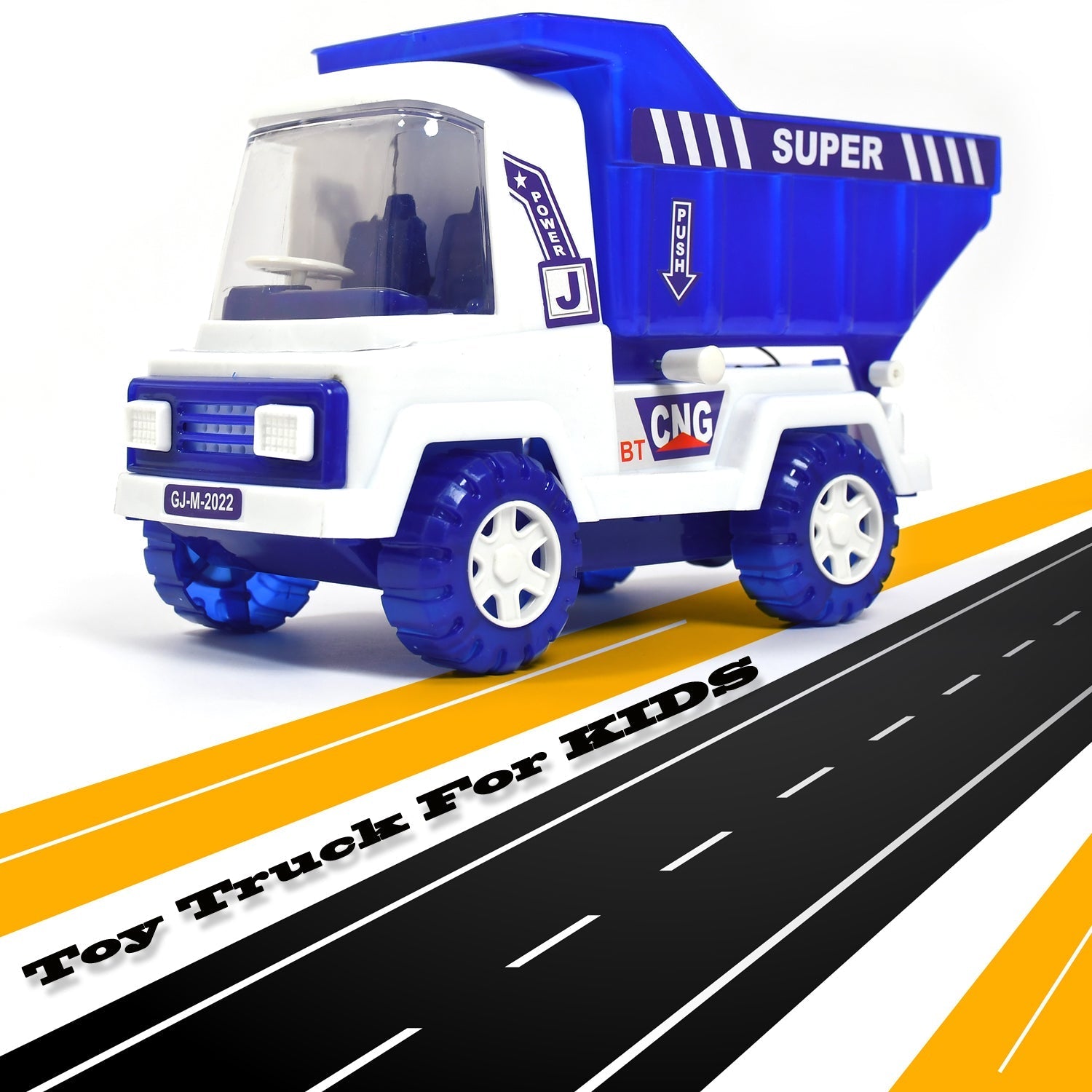 A child's hand pushing the big friction dumper truck forward on a tiled floor.
