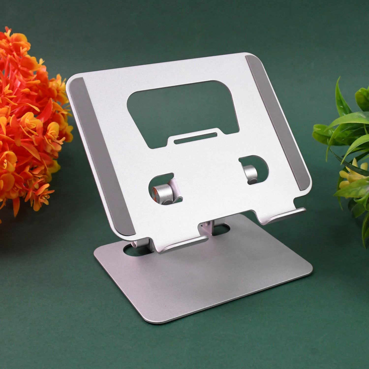 Ergonomic metal alloy tablet stand displayed open on a desk.
