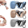 Multicolor keychain nail clipper, folded and ready for use.