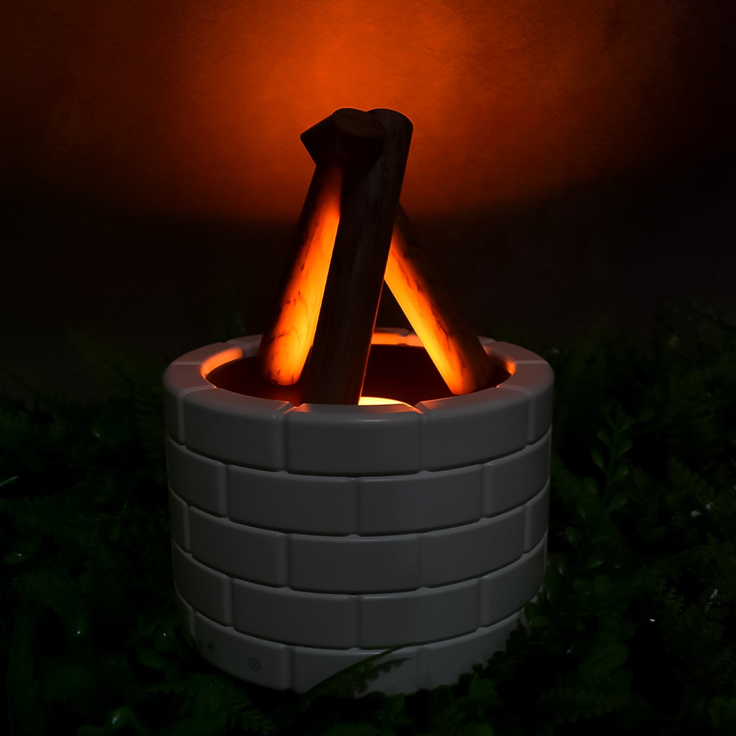Airvanta Flame Diffuser with bonfire effect, emitting a gentle mist in a living room setting.