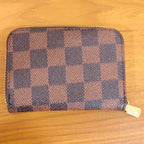 Side angle of zip card holder wallet showing design