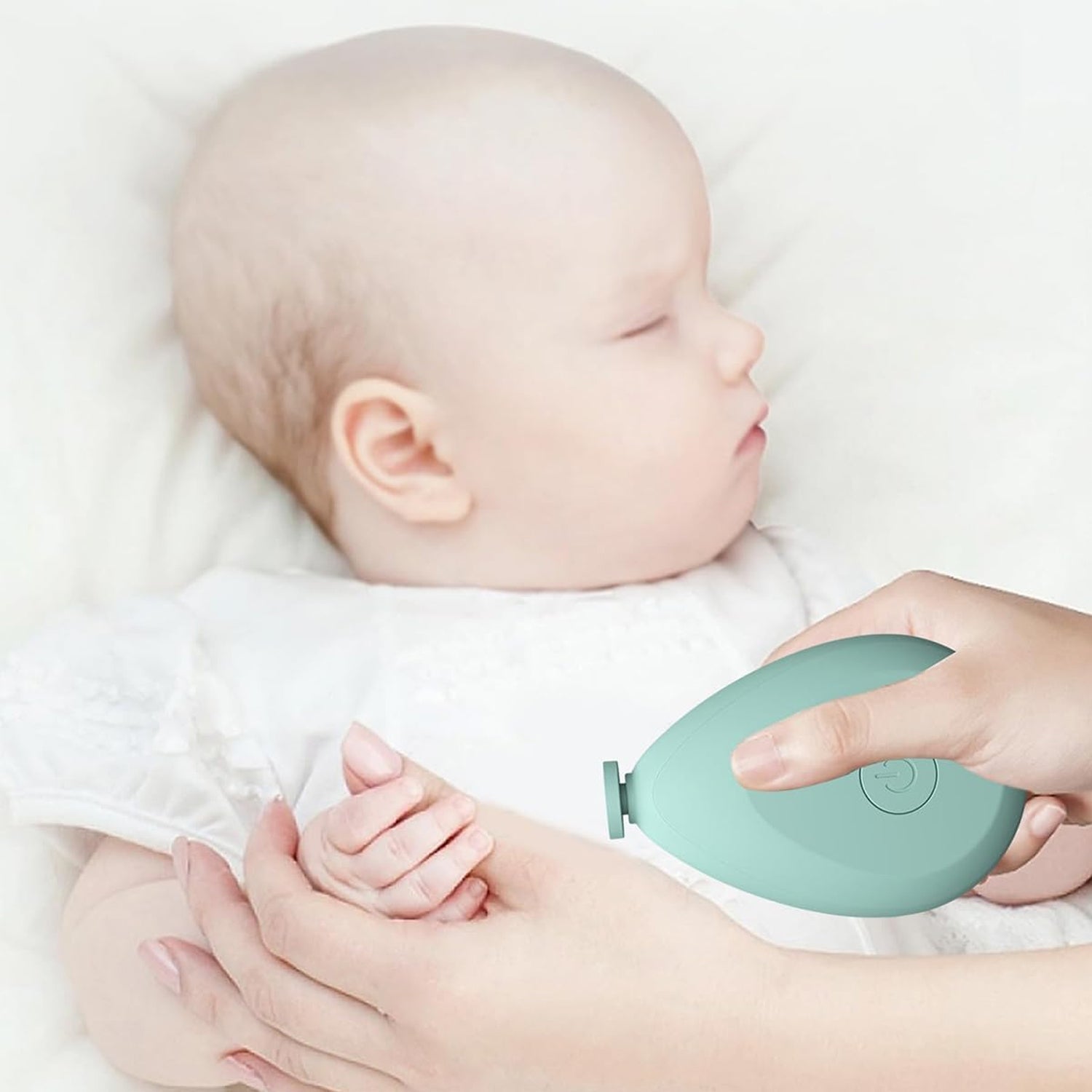 The complete Baby Electric Nail File set, including the device and multiple grinding attachments.