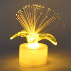 Fiber optic LED centerpieces arranged on a table, creating a festive ambiance.