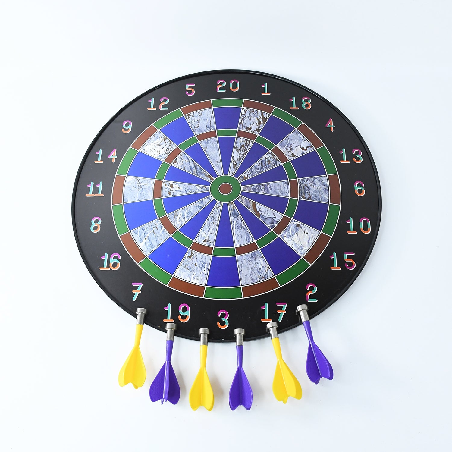 Magnetic dart board mounted on wall for indoor dart games