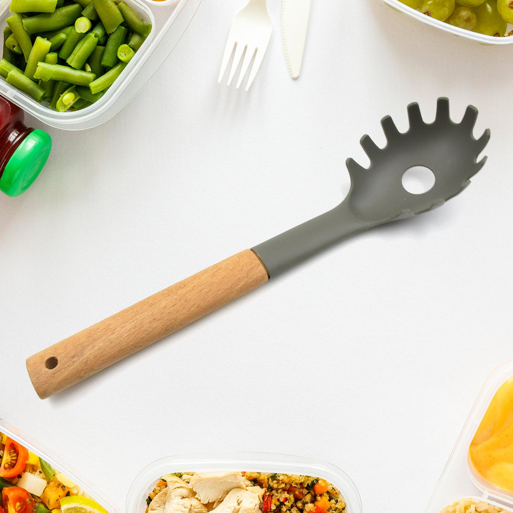 Side view of the ergonomic handle of the plastic serving fork.