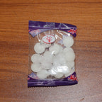 Compact 20 gm packet of naphthalene mothballs for home cupboard use