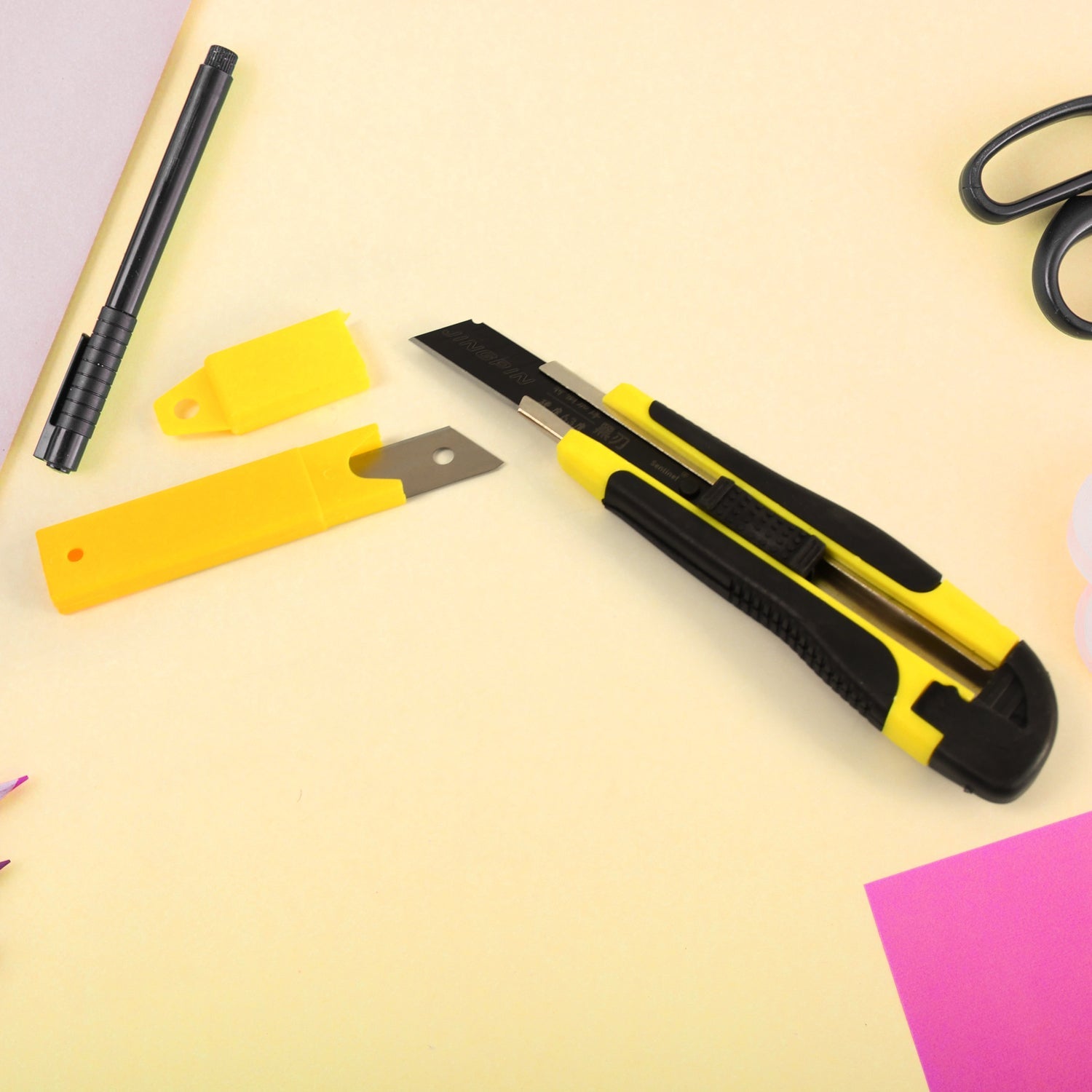 Cutter knives in multiple colors showing the compact design