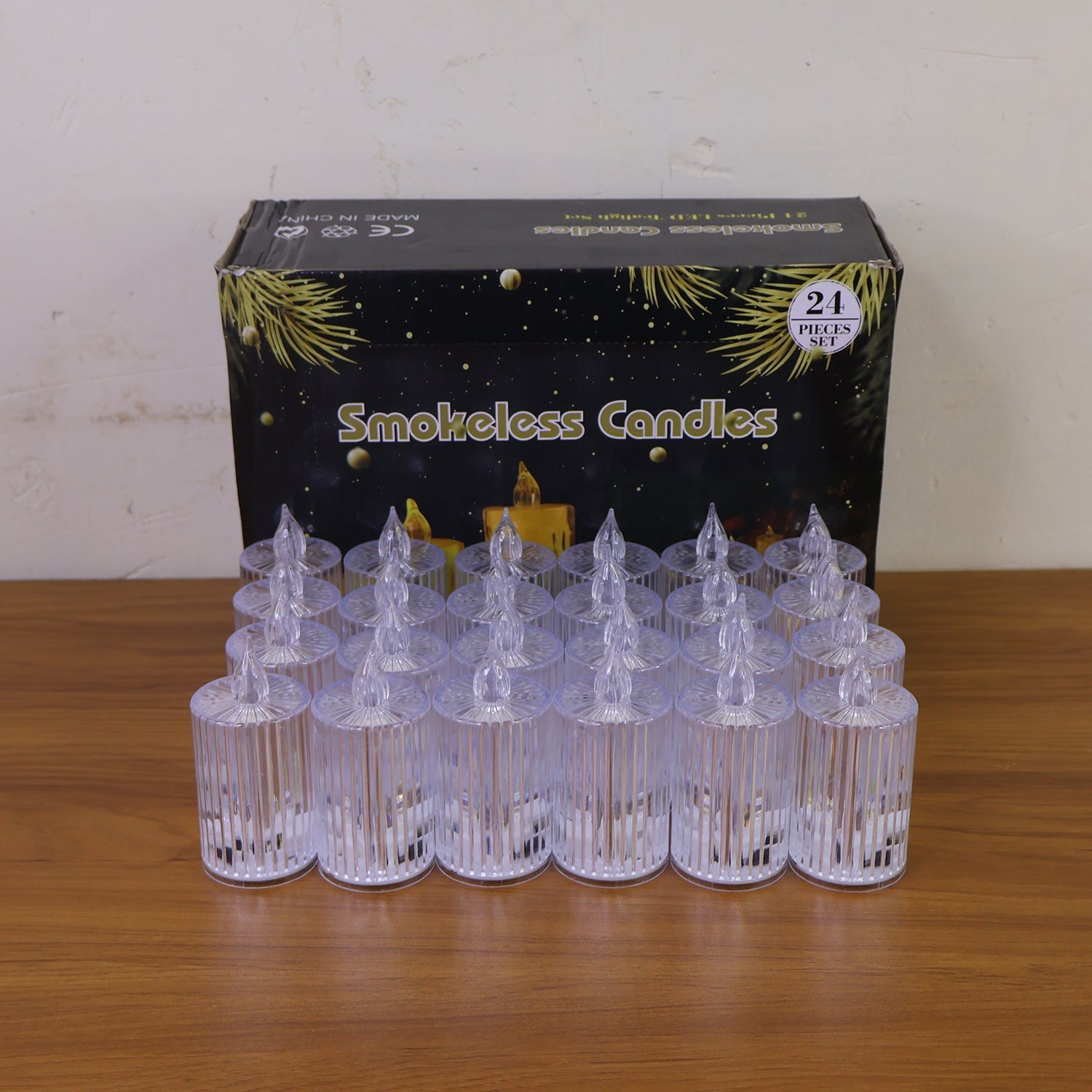 Collection of 24 safe, reusable LED flameless decorative candles ideal for festive decor