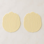 Silicone leaf coaster protecting surface from heat and moisture with hot beverage