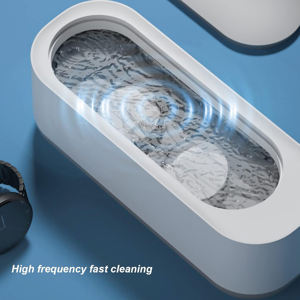 High-frequency vibration ultrasonic cleaning device with a lid open.