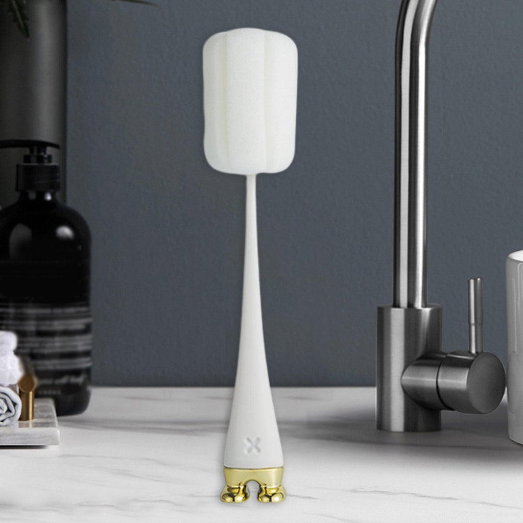 Silicone bottle cleaning brush with its flexible head conforming to bottle contours for thorough cleaning.