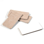 A stack of Safelix felt floor protectors, ready to be used on furniture legs.