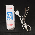 Fast heating immersion rod being used to quickly warm water for a bath