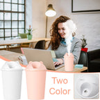 Mini air humidifier cup with USB connection for convenient power on the go.