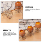 Polished stainless steel egg cup holder showcasing round base stability