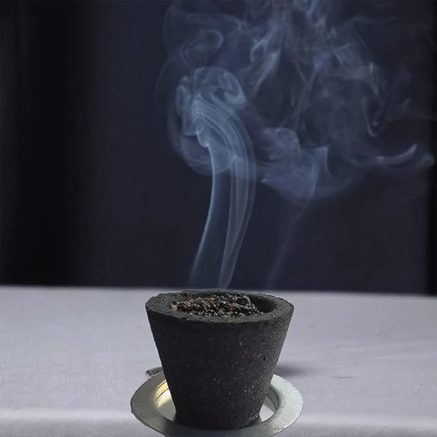 Gugal Sambrani cup featuring a sacred Aum symbol, enhancing its spiritual significance.