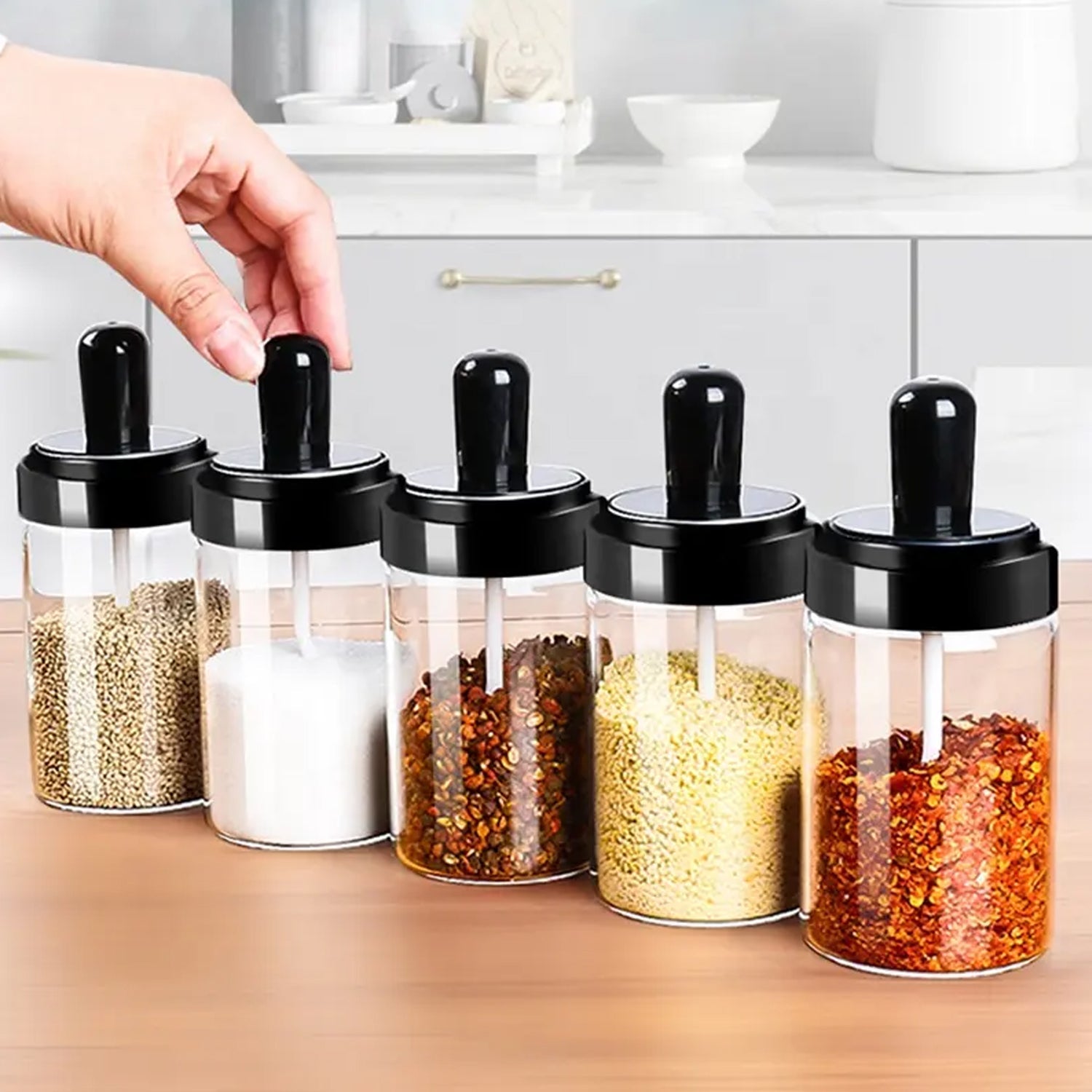 Elegant hexagonal glass masala box, ideal for modern spice storage solutions.