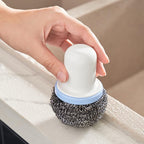 Ergonomic Pro Clean dish cleaning brush for kitchen use.