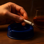 Large capacity dark blue plastic ashtray with three cigarette grooves